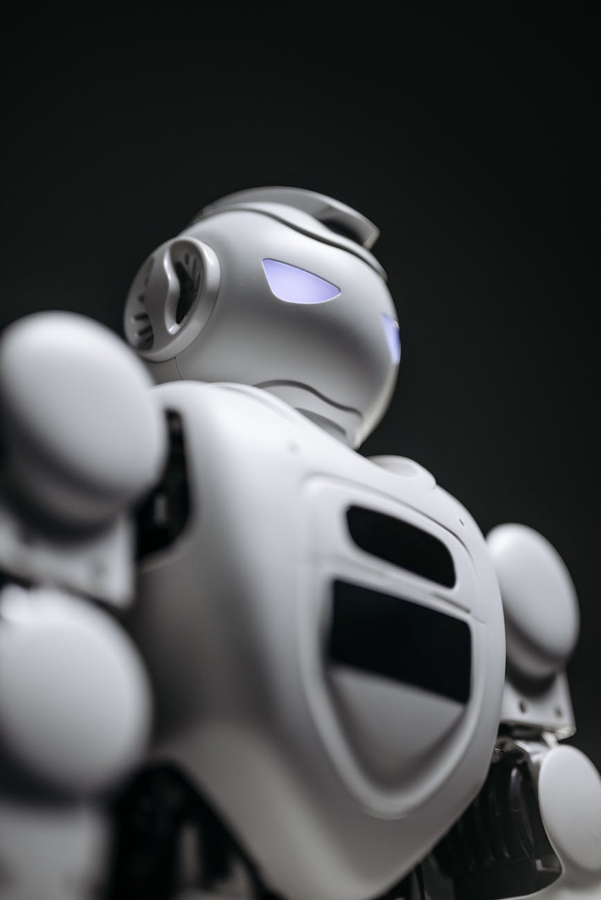 grayscale photo of a futuristic robot